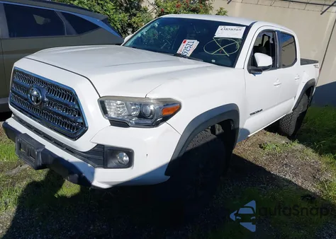 2016 Toyota Tacoma Trd Off Road z USA, uszkodzony, nr VIN 3TMAZ5CN7GM022521